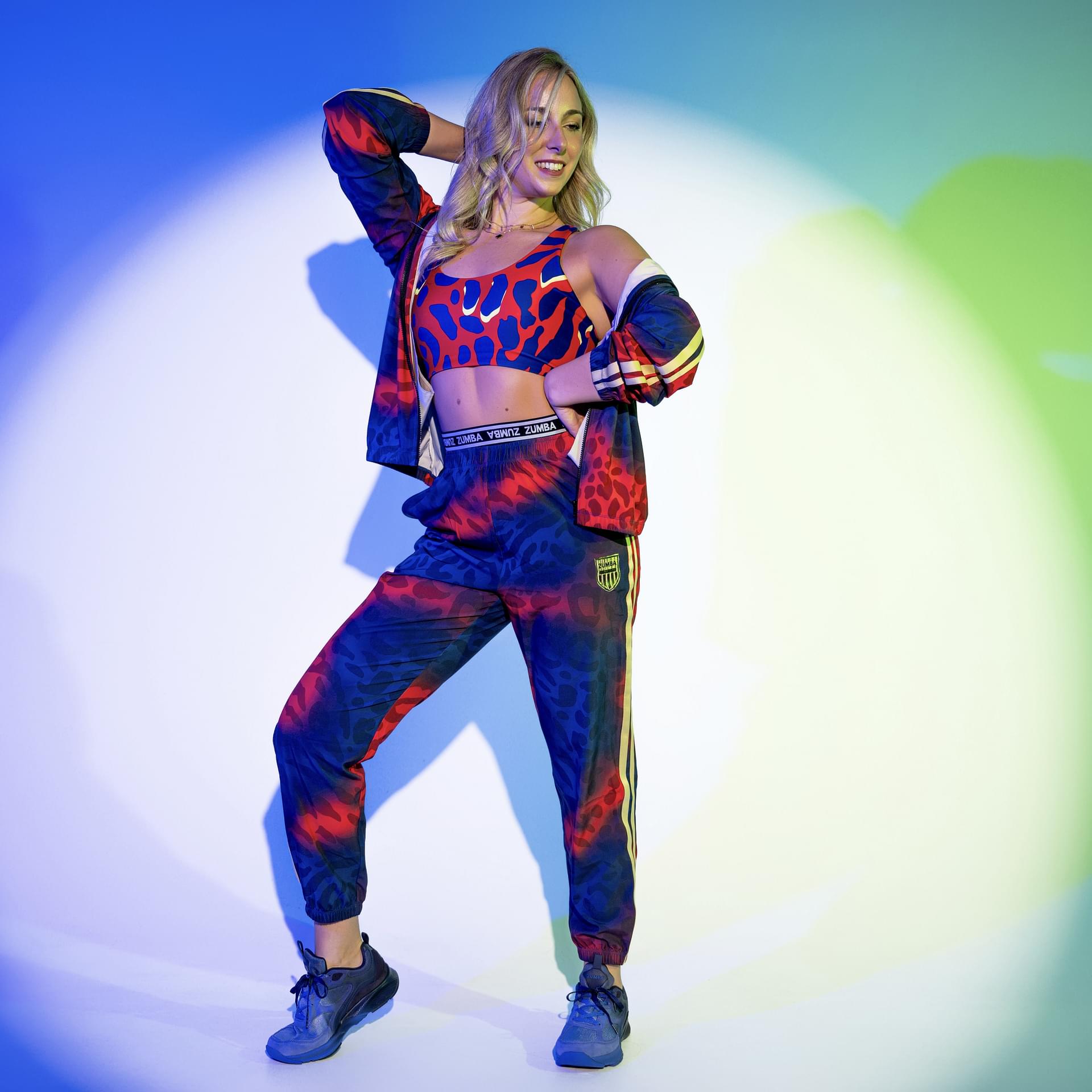 ズンバ Victory Zip Up Mock Neck Woven Raglan Jacket Red/Blue Victory Zip Up Mock Neck Woven Raglan Jacket – Zumba Wear